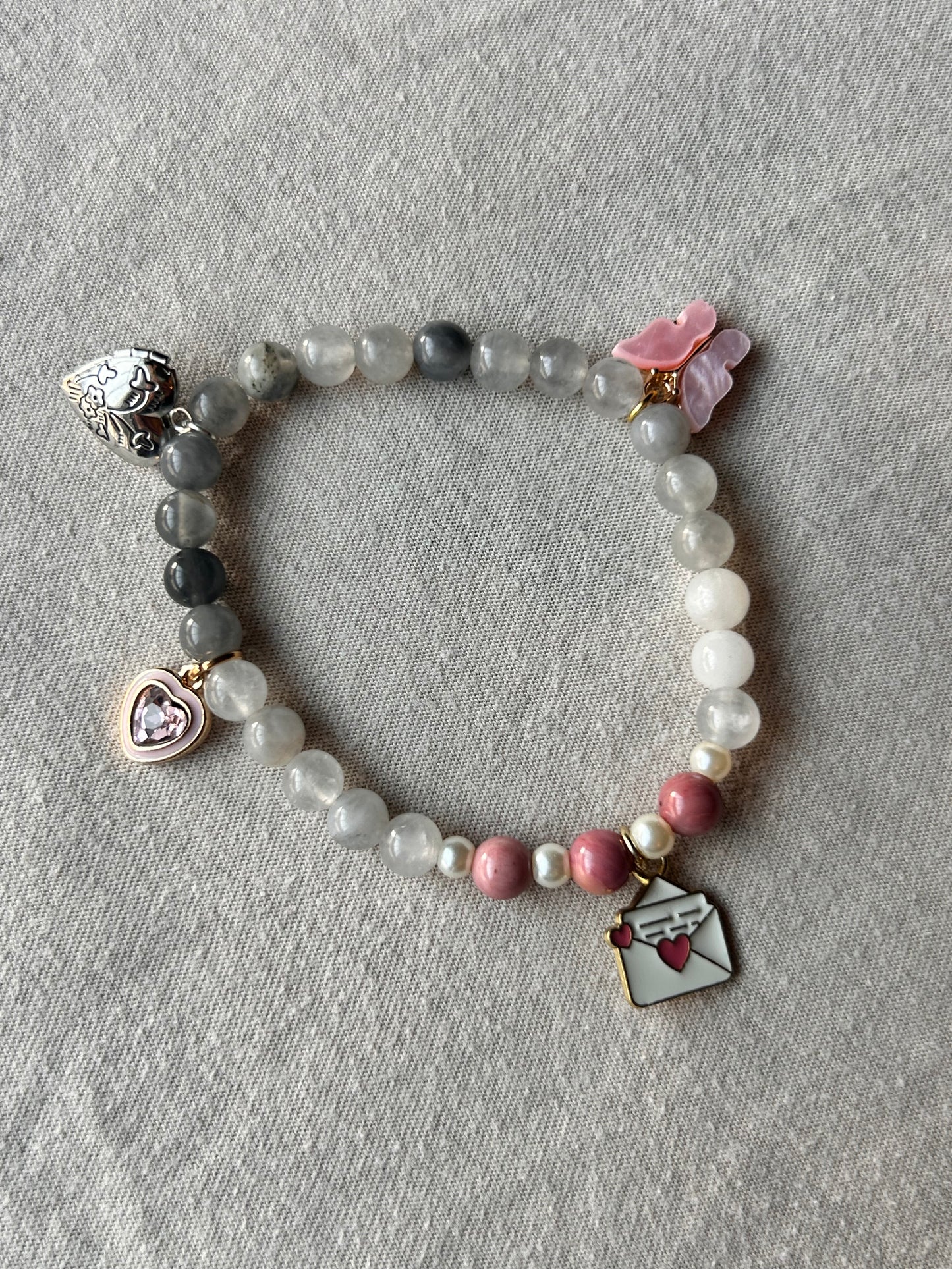 Smokey Quarts and Rohdanite Charm Bracelet
